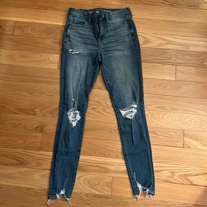 American Eagle super high rise jegging ripped knees the dream Jean size 4 reg